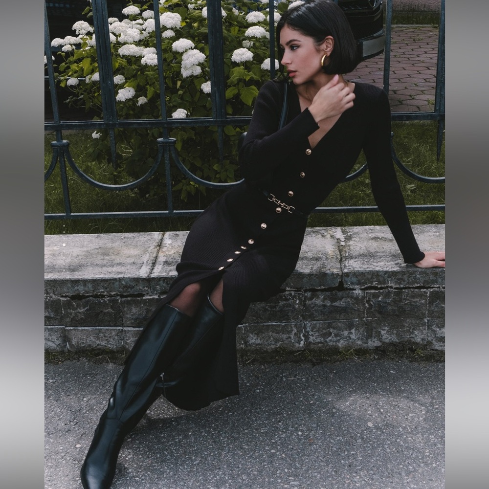 Knitted midi dress with a belt and golden decorations